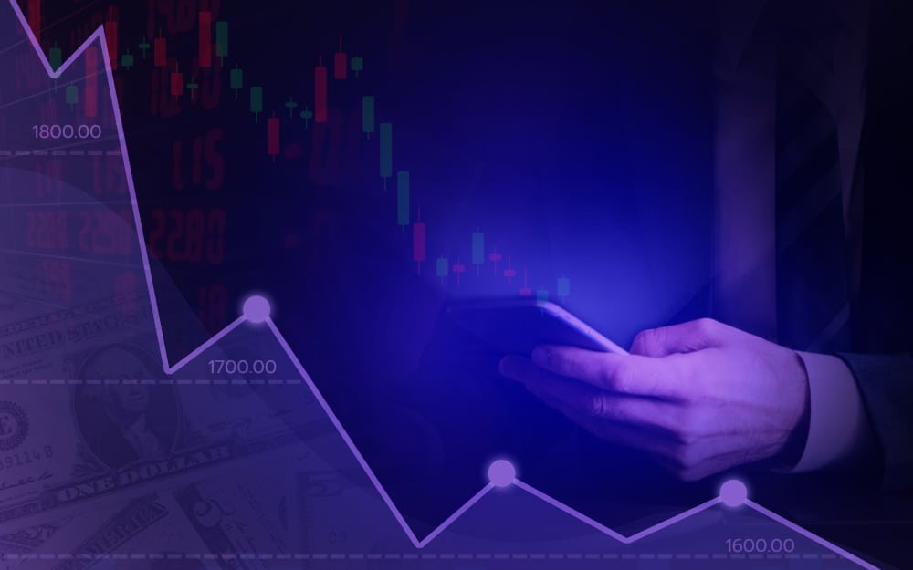 business graph showing growth,stock market on blue color and hand mobile